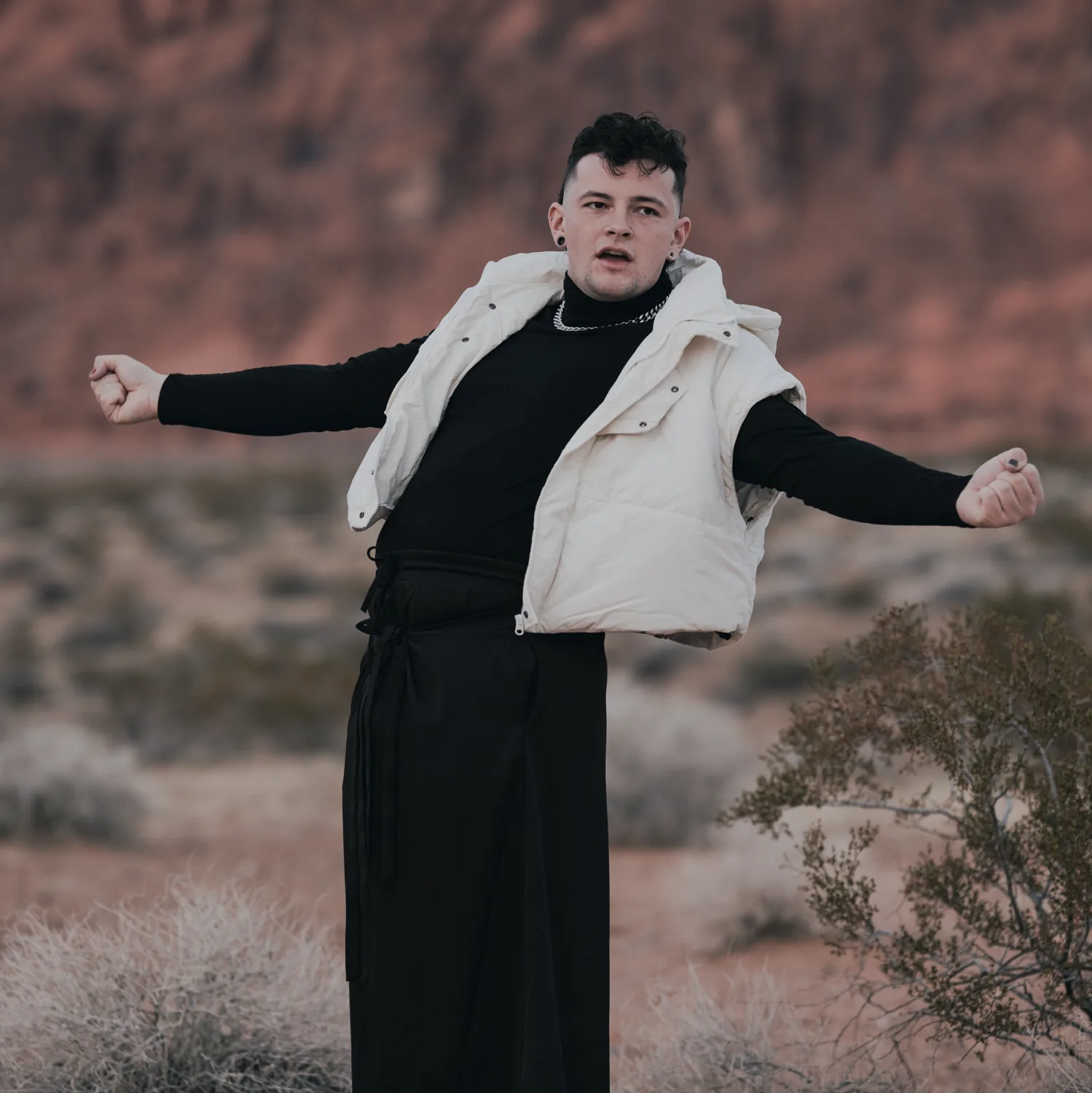 Artist in motion in the desert